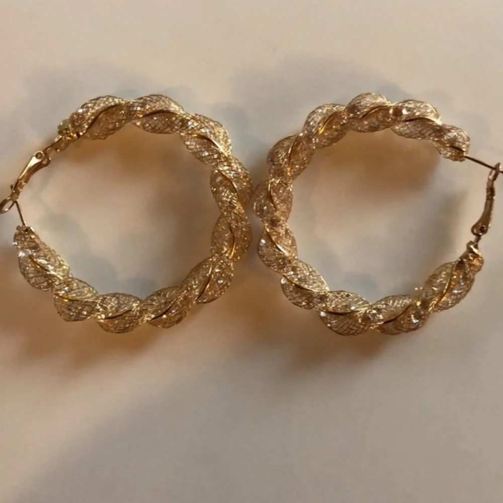 Spiral twist hoop earrings for pierced ears